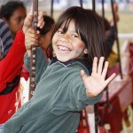 Niños en calesitas