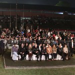 Autoridades y público